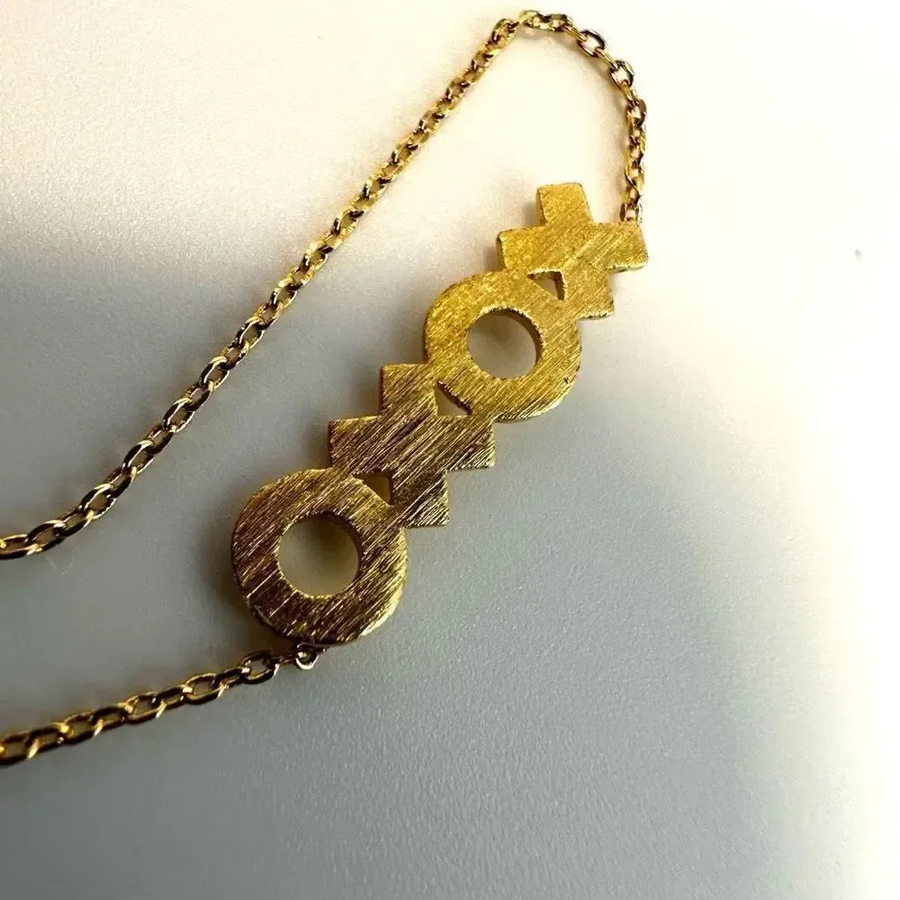 Gold tone XOXO pendant dainty necklace